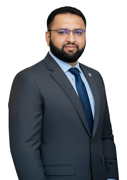 Rana M. Ahson Javid, Managing Partner at E Design Services, standing in a professional suit with a confident expression.